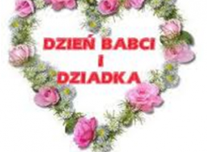 serce ułożone z kwiatów, w środku napis Dzień Babci i Dziadka